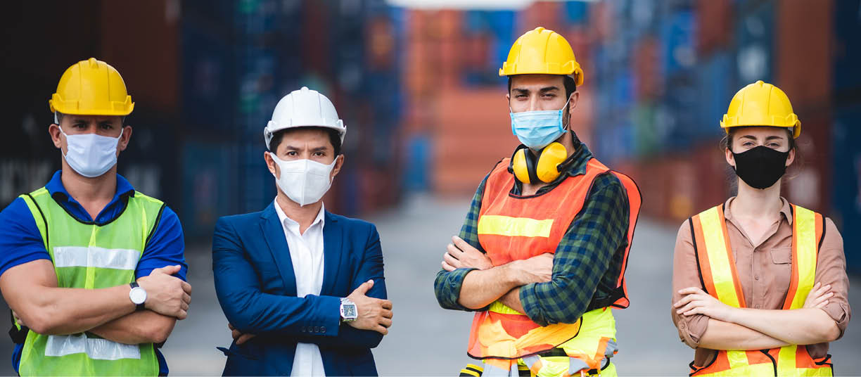 worker group with engineer, foreman, and manager are wearing medical protection face mask in industry working site, working measures to prevent the spread of the virus COVID-19