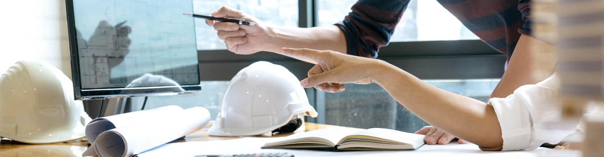 in the office  engineer or architectural project, two engineering or architecture discussing and working on blueprint with architect equipment, Construction concept 